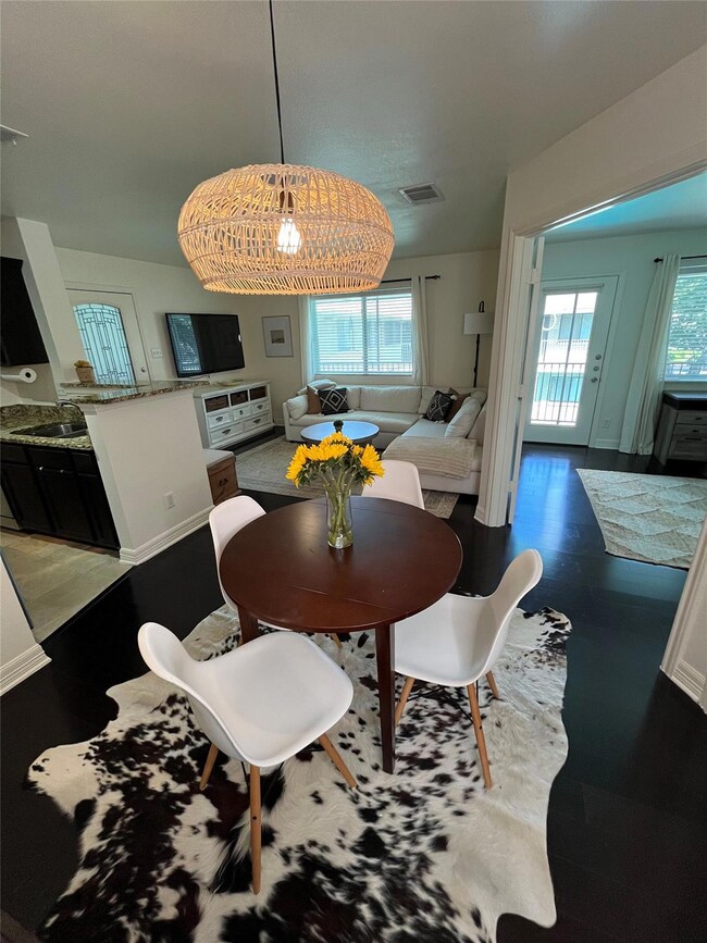 Dining area with wood finished floors