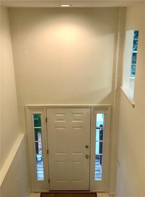 The two story staircase is dramatic!
