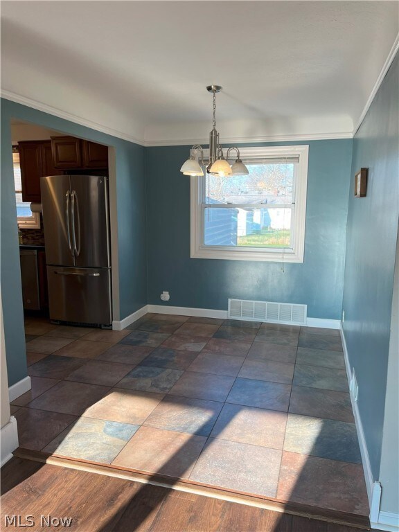 Ceramic tile in eat-in kitchen.
