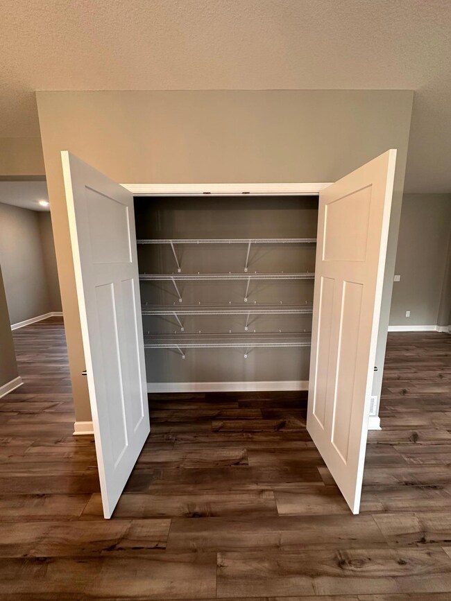 Double door pantry in the kitchen - space for all your big kitchen appliances and food.