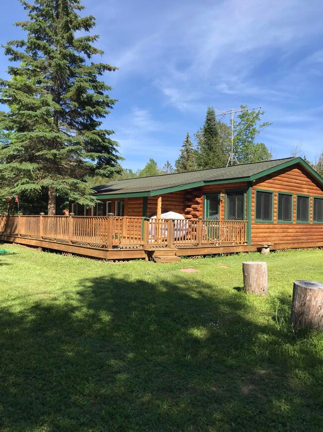 NE side of Log Cabin
