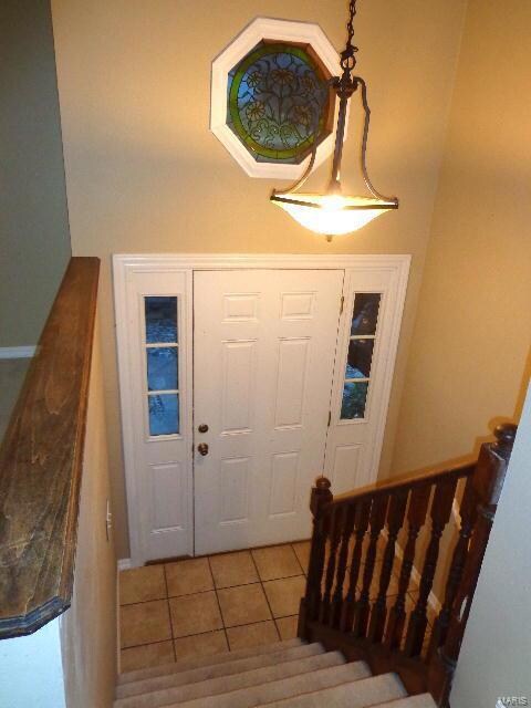 Lovely entry foyer - notice the stained glass with