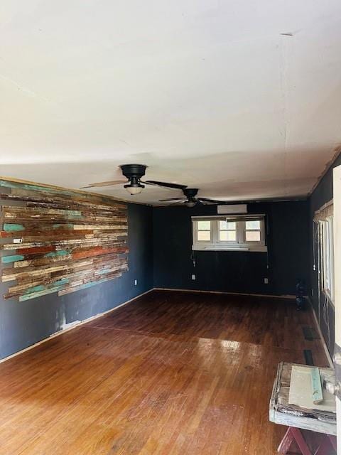 Spare room with dark hardwood / wood-style floors 
