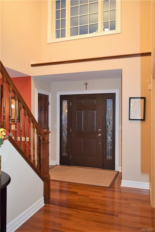 You are welcomed to this home by the large, open, 