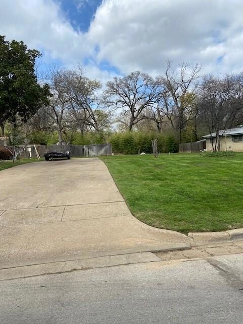 Curb and driveway established for access to the lo