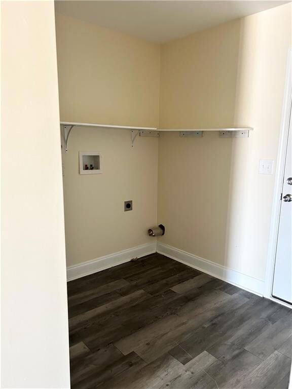 PHOTO IS A REPRESENTATION OF THE PROPERTY DUE TO OCCUPANCY-Laundry room featuring hookup for a washing machine and electric dryer. SOME UNITS INCLUDE A SET