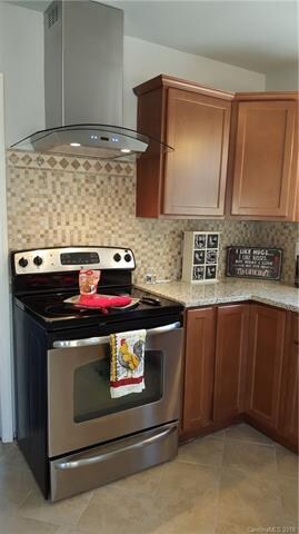 Betty Crocker would be envious!  All new cabinets,