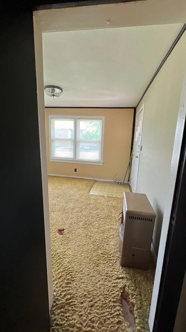 Hall with carpet flooring