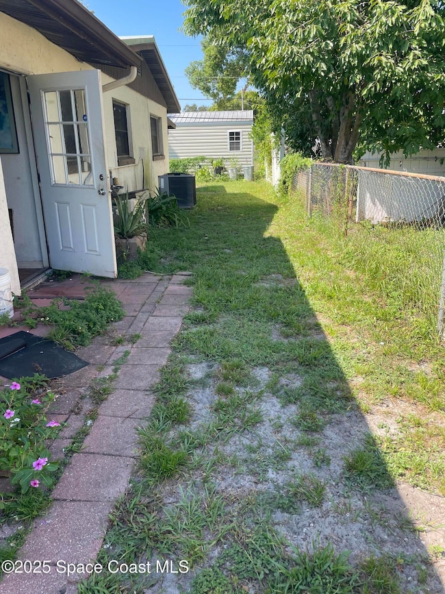 1144 N Singleton Ave, Titusville, FL 32796 - photo 2