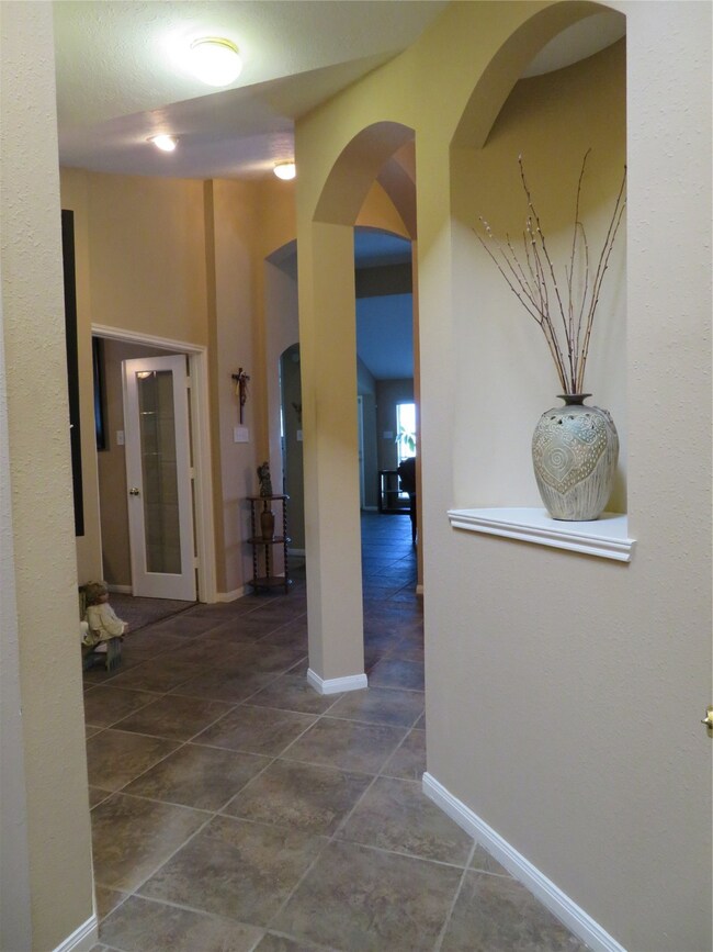 from foyer looking toward study on the left and the formal dining room on the right