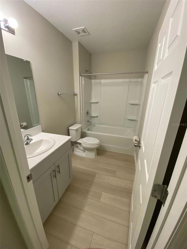 7504 Wallflower Trail, Wesley Chapel, FL 33545 - photo 4