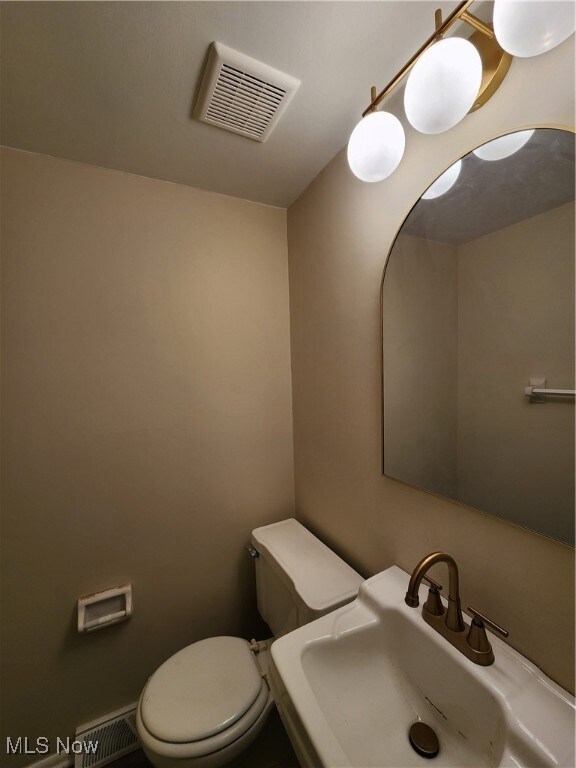 Bathroom with toilet and a sink