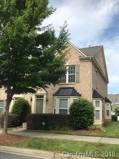 Front and right side of town home with bay windows