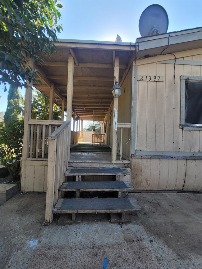 doorway to property featuring a deck