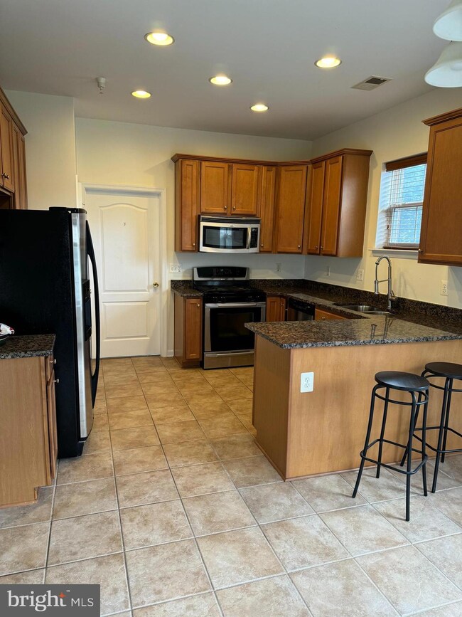 9713 Handerson Place unit 101, Manassas Park, VA 20111 - photo 6