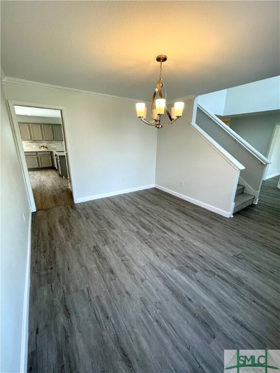 Formal dining room with entry to island kitchen.