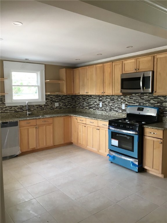Large eat-in Kitchen with plenty of storage room.