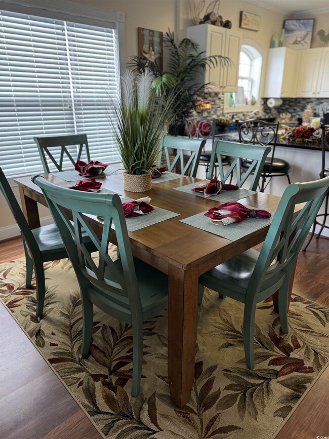 Dining room featuring hardwood / wood-style floori