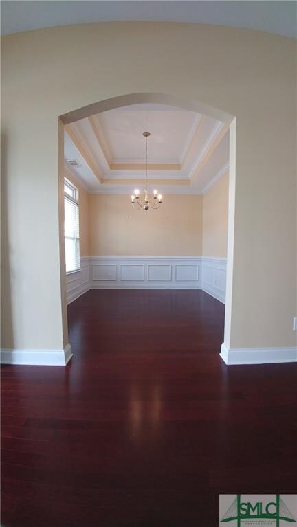 View of dining room from center hall with panel wa
