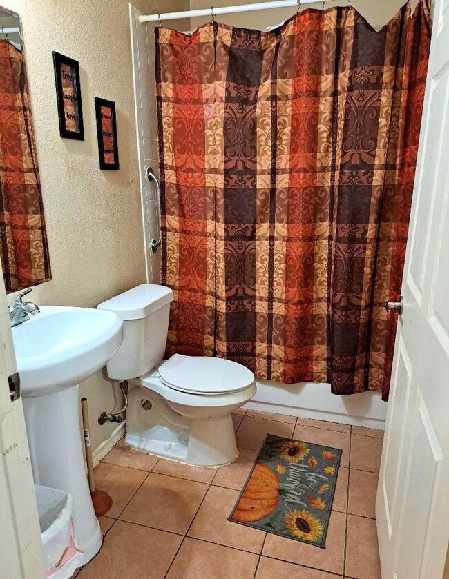 Full bathroom featuring shower / bath combination 