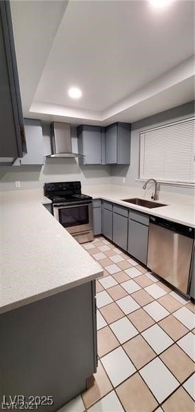 Kitchen with gray cabinets, stainless steel applia