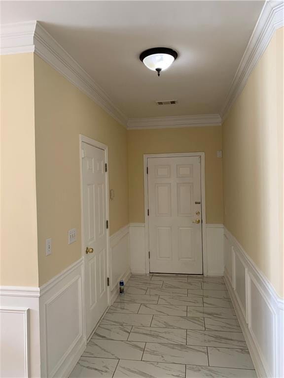 Doorway to outside with ornamental molding