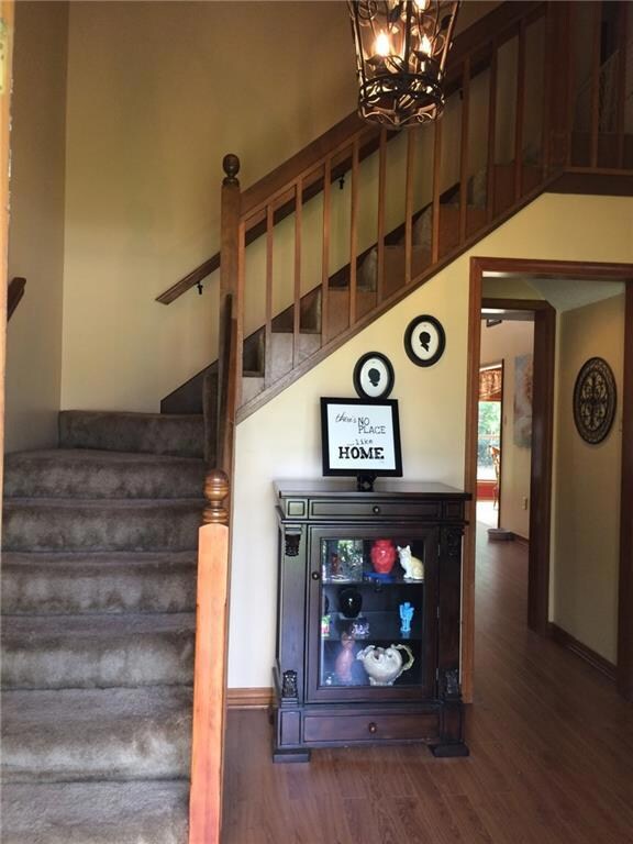 Lovely 2-story foyer with laminate wood floors.  F