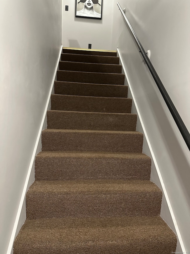 Stairs up to upper level