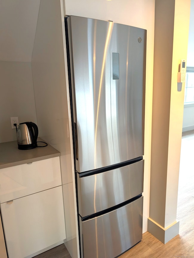Refrigerator and prep area.