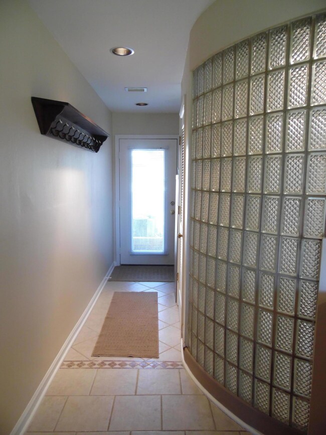 Glass block shower wall & foyer