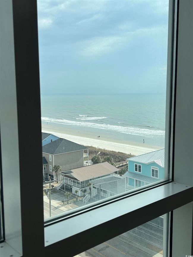 View of water feature with a beach view
