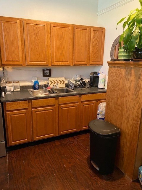 Galley style kitchen - sink & cabinets