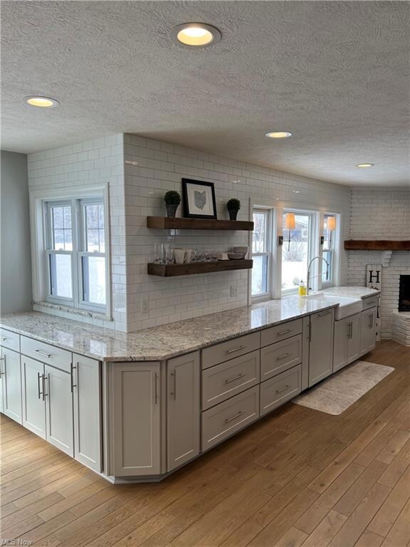 Another view of kitchen and dinette