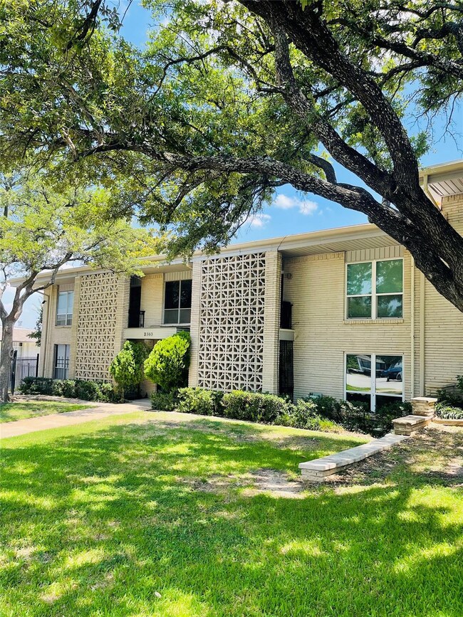 View of front of property with a front yard
