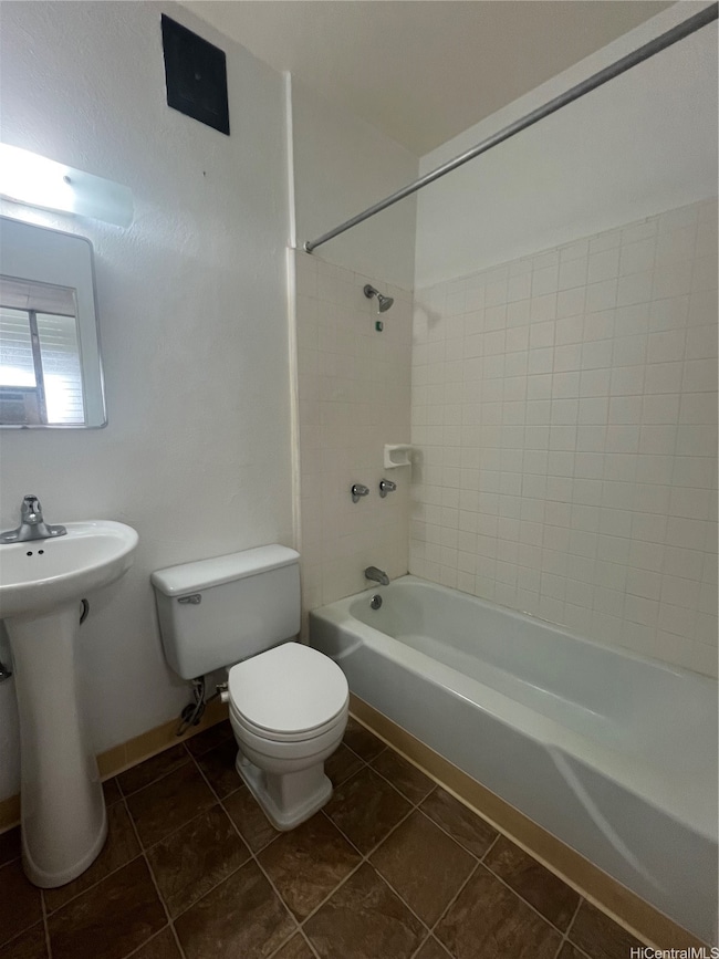 Bathroom with full sized tub/shower.