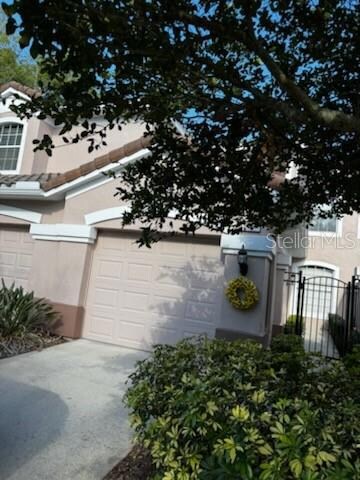 Entrance to home driveway and gate courtyard