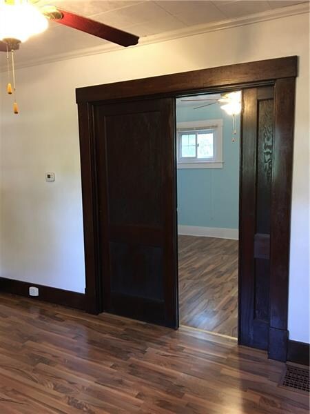 Pocket doors between living room and family room.
