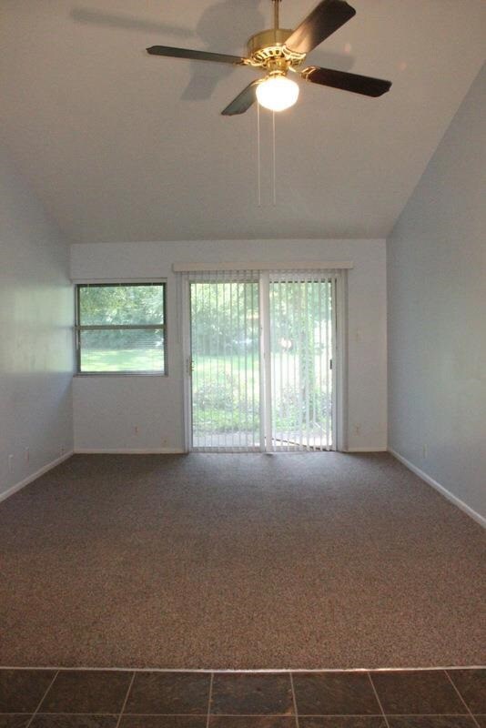 A view of the family and dining room from the front door.