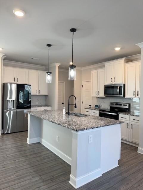 Kitchen featuring appliances with stainless steel 