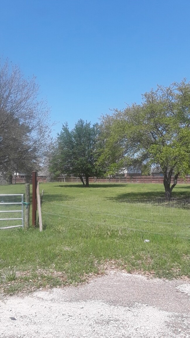 GORGEOUS OAK TREES ALREADY ON LOT