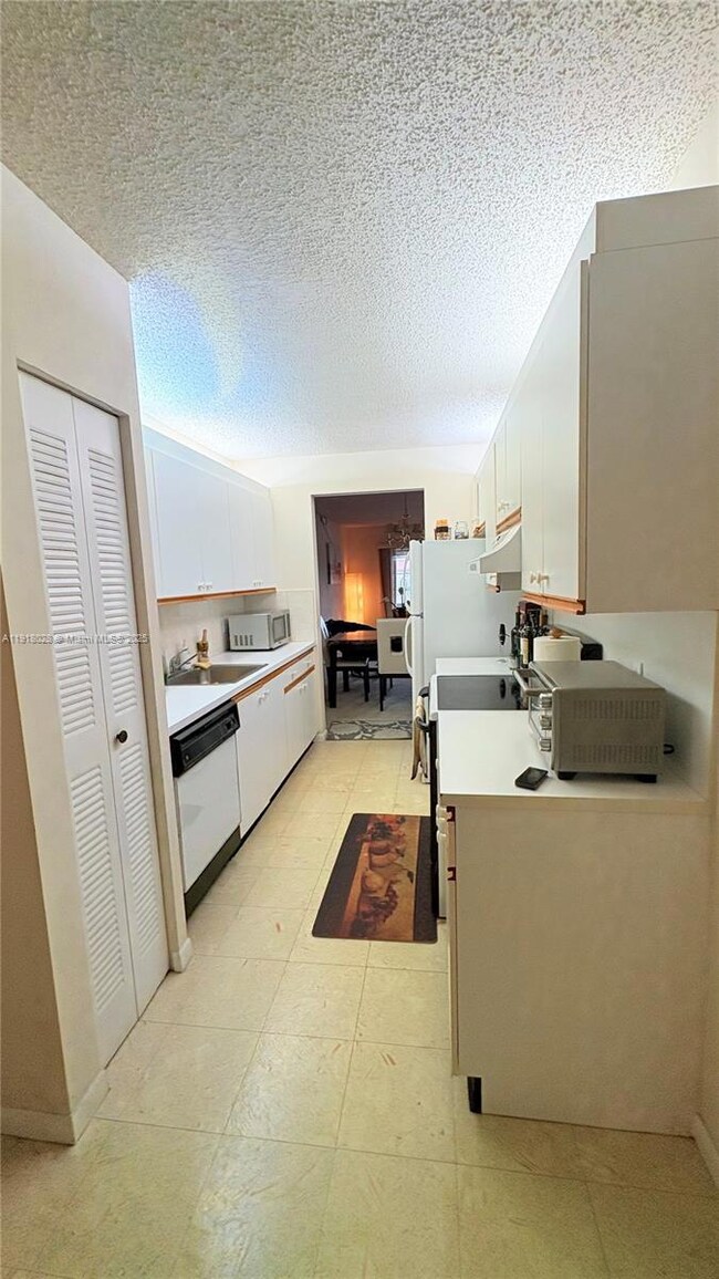 12900 SW 13th St unit E413, Pembroke Pines, FL 33027 - photo 3