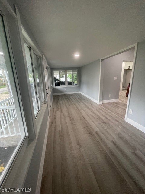 Enclosed Lanai now part of the home with new windows throughout. Great sitting area or office area.