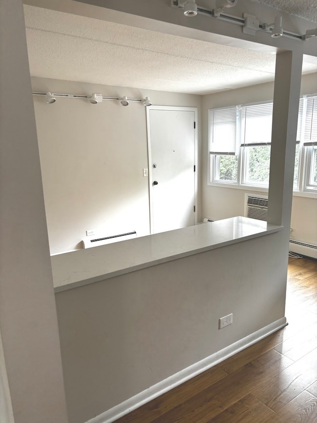 Extra counter with room for chairs to eat on.