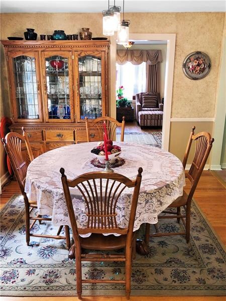Dining Room featuring awesome original character including hardwood floors!
