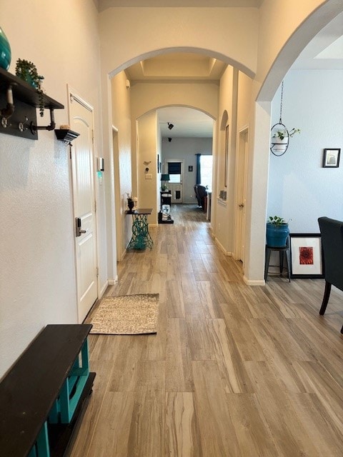 Bright and inviting hallway with wood-style floori