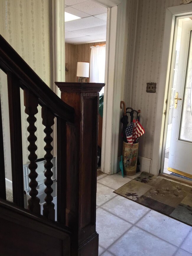 Front Foyer w/ Entrance To Den
