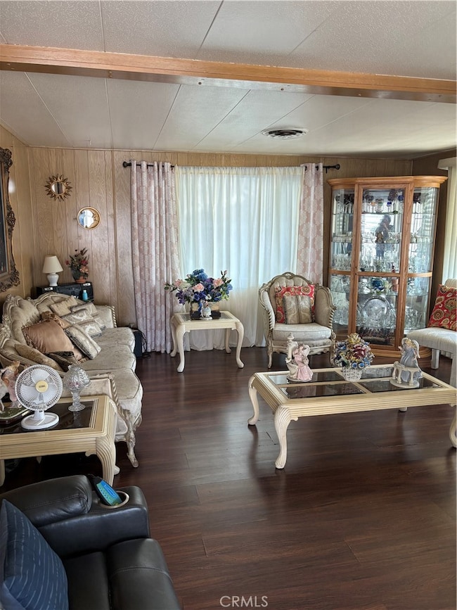 large living room with lots of windows