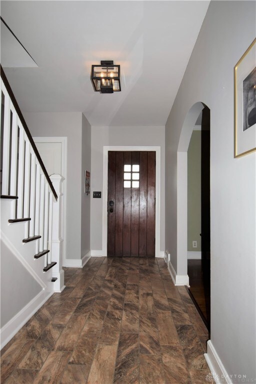 Front hallway with living room to right