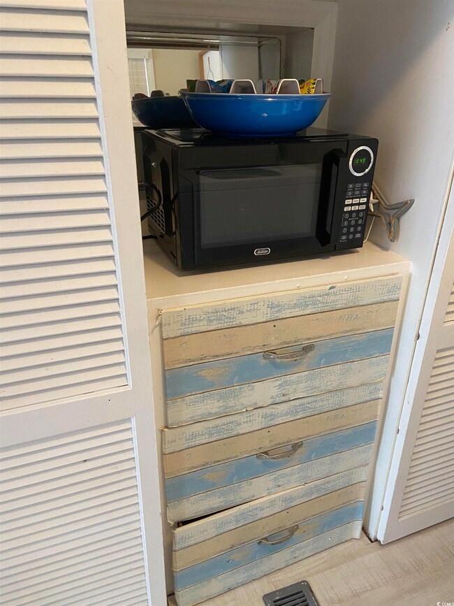 Details featuring hardwood / wood-style floors