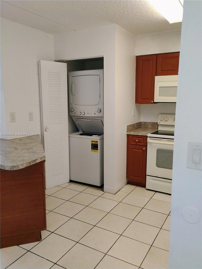 Mirassou Condominium unit 304, Hialeah, FL 33015 - photo 2